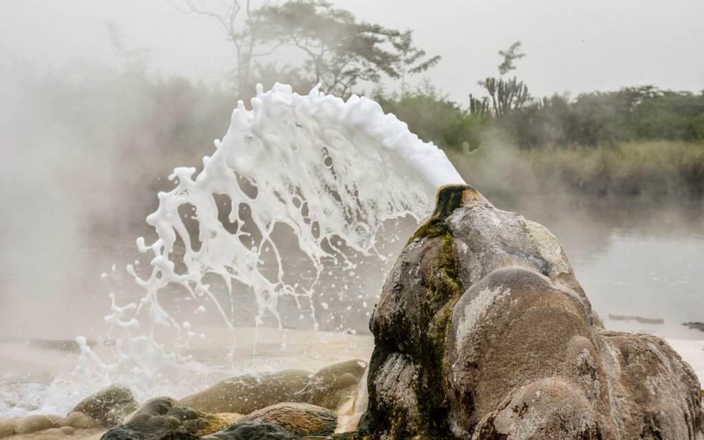 Hot springs in Semuliki National Park surrounded by natural forest during an unforgettable Uganda safari adventure.
